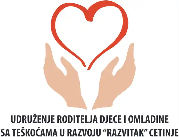 Logo udruženja Razvitak Cetinje: srce iznad dvije šake
